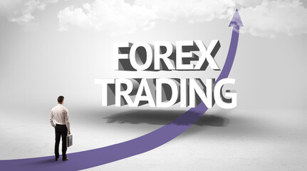 Rear view of a businessman standing in front of FOREX TRADING inscription, successful business concept
