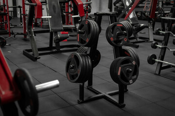 Fototapeta na wymiar Equipment And Machines At The Modern Gym Room Fitness Center