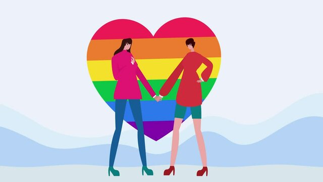 Lesbian couple holding hands near rainbow heart