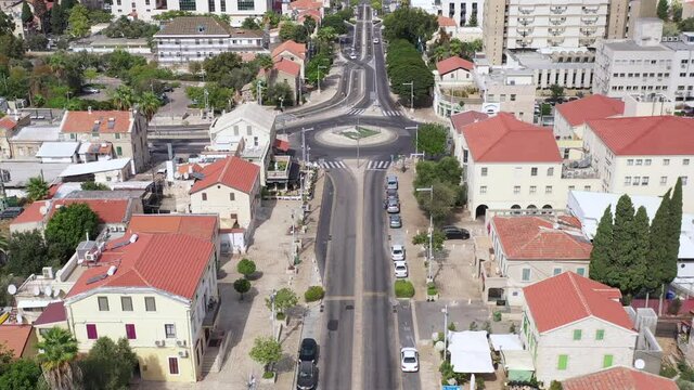 Corona Virus days, Haifa German colony Ben Gurion street with no people of traffic due to Government lockdown guidelines, aerial view.