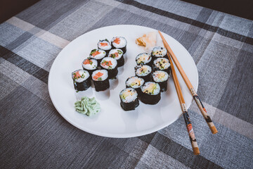 Sushi rolls on a table