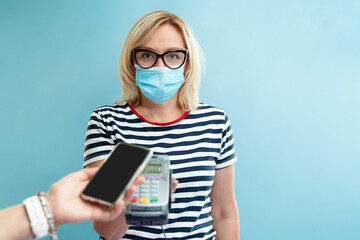 Caucasian female business owner get payment with contactless smartphone pay. pandemic smart banking