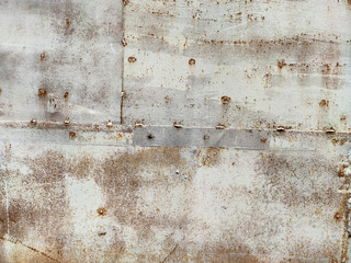 Rusty metal background with streaks of rust. Corroded metal background. Rust stains. Rystycorrosion.