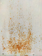 Corroded metal background. Rusty metal background with streaks of rust. Rust stains. Rystycorrosion.