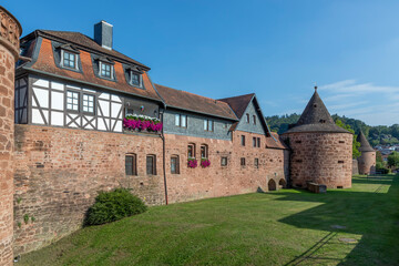 view of the historic city wall with half timbered houses in Budingen, Germany
