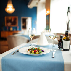 Spanish peeled tomato salad on restaurant table