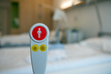 Nurse call button to call the nurse for help in the hospital. Concept: care and health
