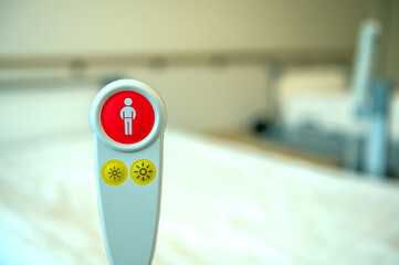 Nurse call button to call the nurse for help in the hospital. Concept: care and health
