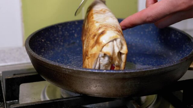 Cooking Meat Shawarma in a Hot Pan Until Crisp. Fry Pita Bread in Kitchen.