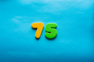 75 years old celebrating classic logo. Colored happy anniversary 75 th template colorful numbers....