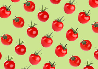 Fresh tomatoes on pale green background. Pattern design