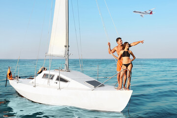 Couple on yacht and airplane in sky over sea. Summer vacation