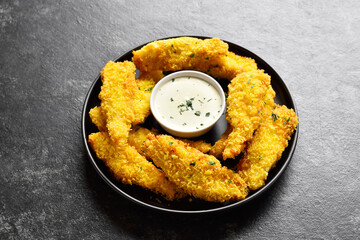 Crispy fried breaded chicken breast strips