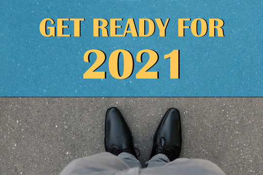 Text Get Ready For 2021 On Asphalt In Front Of Man, Top View