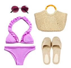 Set with swimsuit and summer accessories on white background, top view. Beach look