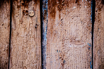Old wooden doors. Shabby wood background. Scratched wood background. Old shabby boards. Wood structure