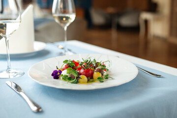 Spanish peeled tomato salad on restaurant table