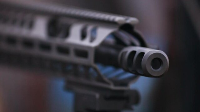 A gun is fired in closeup shot