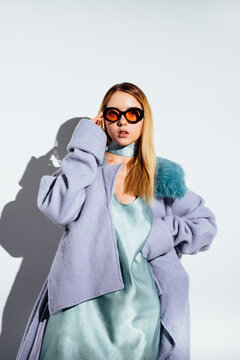 Model Posing in Pastel Blue Outfit