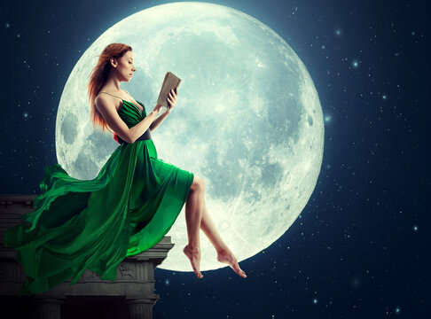 Beautiful woman reading a book sitting on rooftop on a moonlight sky full moon and stars background.