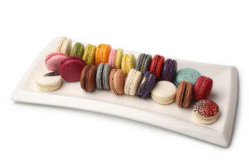 Colorful french macaroons in white dish
