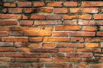 Vintage and aging red brick wall texture and background