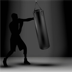 Boxer beats a punching bag on a dark background
