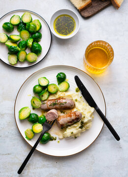 Sausages with mashed potatoes and roasted brussels sprouts