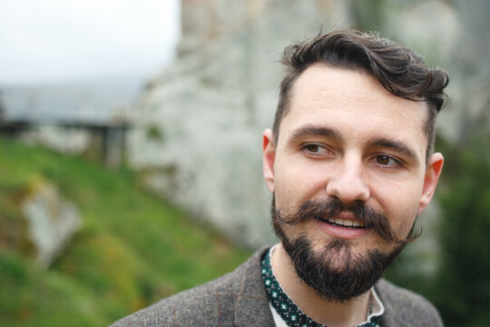 Handsome man with beautiful mustache and beard.