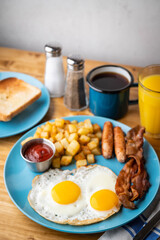 traditional american breakfast on wooden table