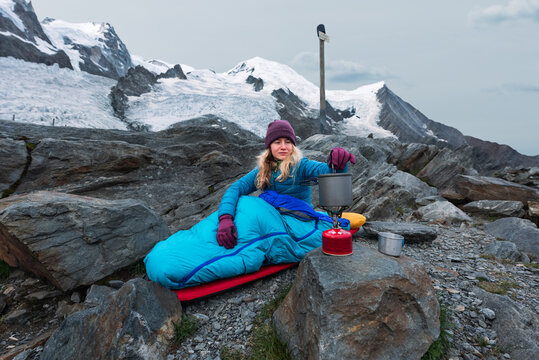 Woman preparing food outdoors
