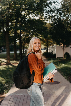 A young woman studying at a college campus