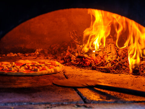 wood fired pizza in oven