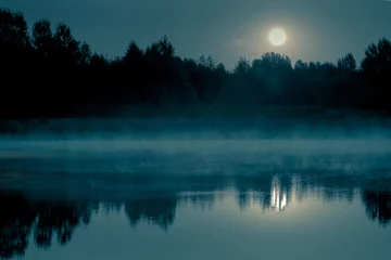 Papier Peint photo Vert bleu Night mystical scenery. Full moon over the foggy river and its reflection in the still water.