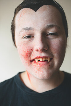 Portrait of a teenage vampire at Halloween