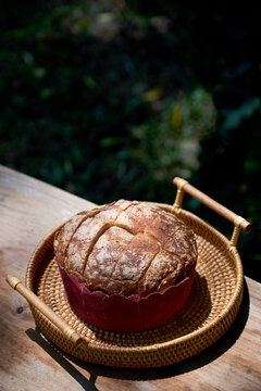 Tested bread on a picnic stone table outdoors