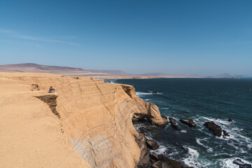Man standing on a high cliff
