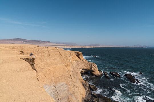 Man standing on a high cliff