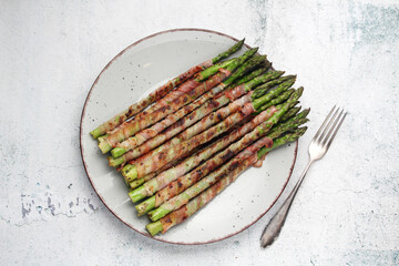 Seasonal fresh asparagus fried with bacon