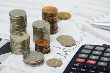 Russian coins with different economic graphs and charts