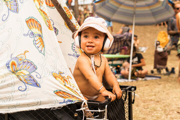 A baby girl's first music festival