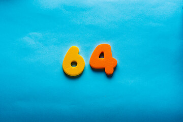 64 years old celebrating classic logo. Colored happy anniversary 64 th template colorful numbers....