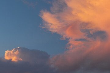 Fototapeta na wymiar Colorful clouds at sunset in blue sky.