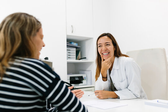 Female doctor attending a patient in her medical office