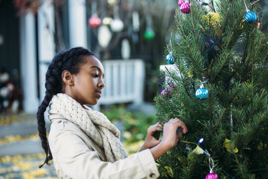 African American Girl and Christmas Tree