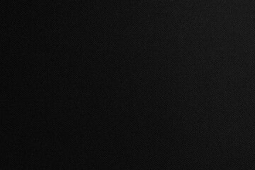Texture of black synthetic woven fabric close up