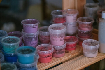 Paint filled containers