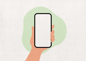 Hand holding a phone on a green paper background