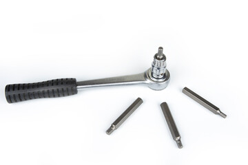 Ratchet with hexagonal bits on a white