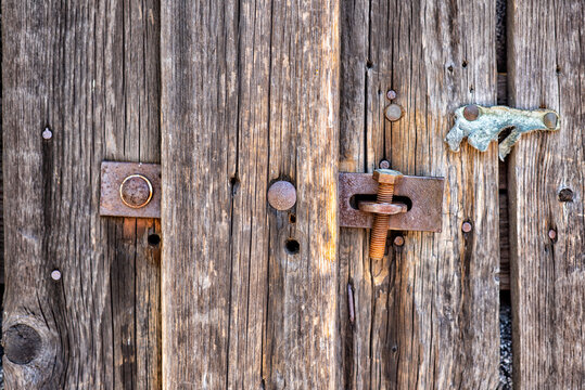 old wooden gate with simple bolt